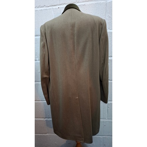 32 - Crombie- An unworn gents pure new wool coat having a brown velvet collar size 42R with original tags... 