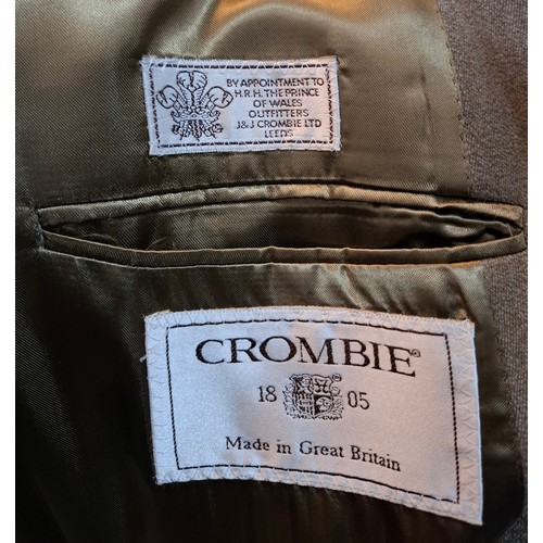 32 - Crombie- An unworn gents pure new wool coat having a brown velvet collar size 42R with original tags... 