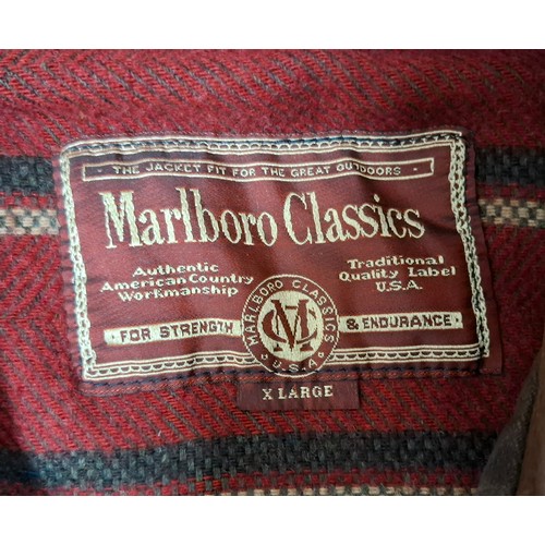 33 - Marlboro Classics- Two gents jackets comprising a navy brushed cotton jacket with brown leather coll... 