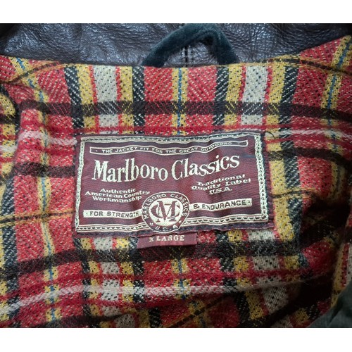 33 - Marlboro Classics- Two gents jackets comprising a navy brushed cotton jacket with brown leather coll... 