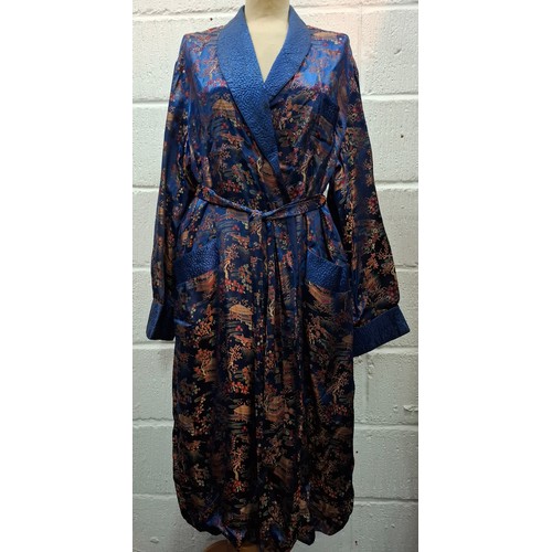 55 - Four late 20th Century Chinese robes to include a gold satin calf length gown having machine embroid... 