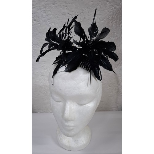 56 - Hats, table linen and throws comprising late 20th Century Jaeger ladies hats, a Bermona Trend black ... 