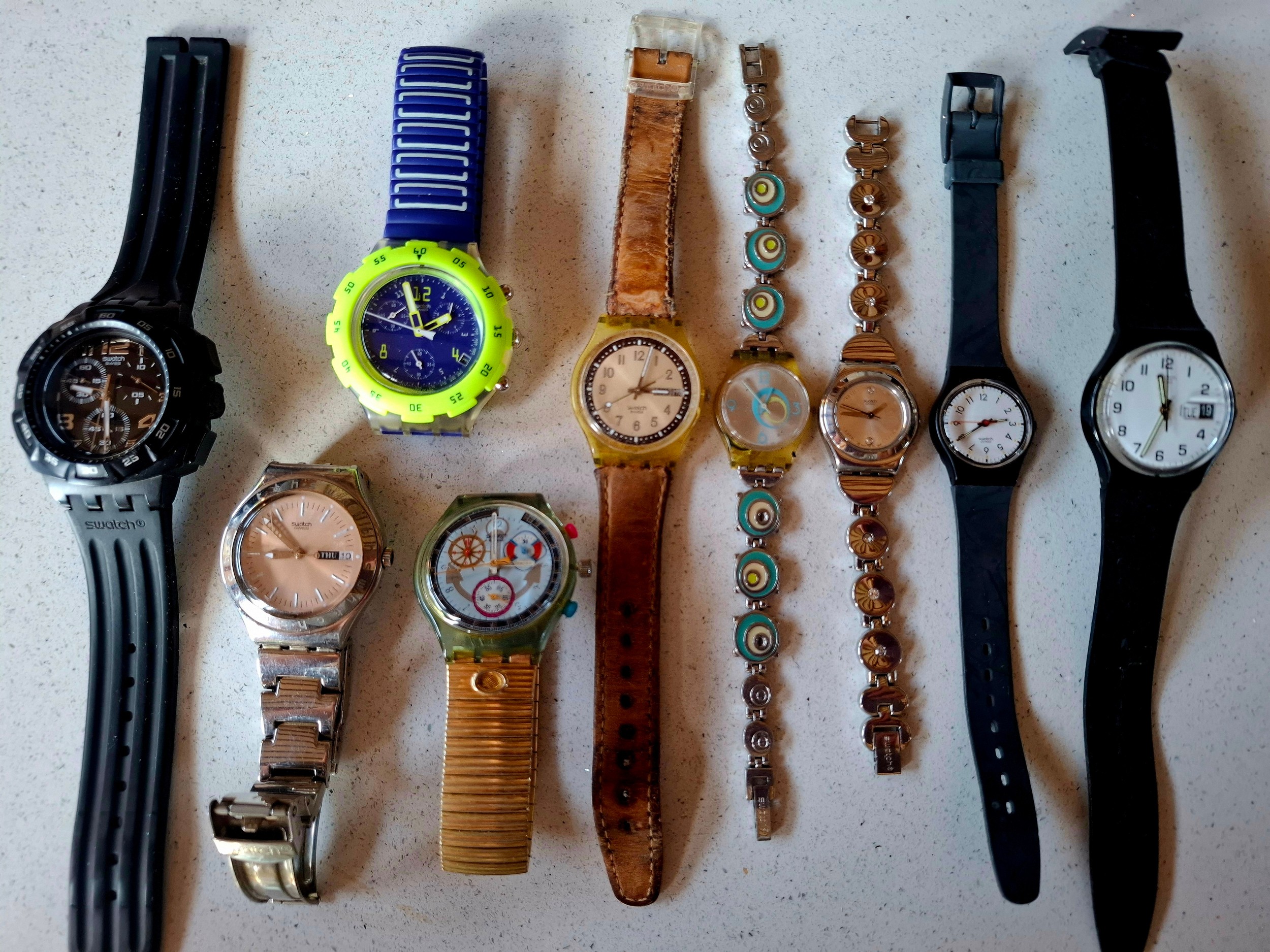 Swatch- A group of 9 fashion watches to include a 2007 Chrono Plastic ...