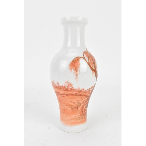 112 - A Chinese porcelain vase, 20th century, of baluster form with flared neck, decorated in iron-red ena... 