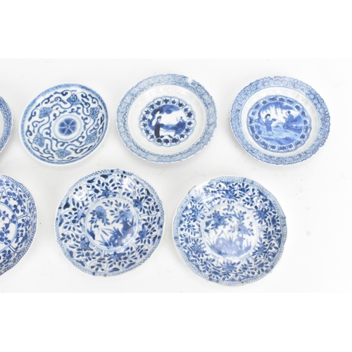 13 - A mixed group of Chinese blue and white porcelain dishes, Qing dynasty, including examples painted w... 