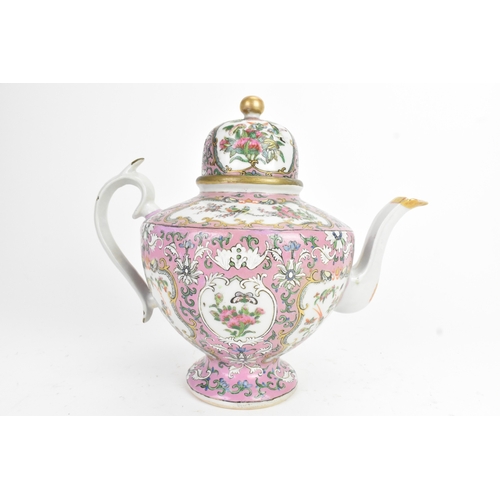 16 - A Chinese Canton famille rose teapot, late 19th century, of baluster form, enamelled with shaped pan... 