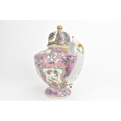 16 - A Chinese Canton famille rose teapot, late 19th century, of baluster form, enamelled with shaped pan... 