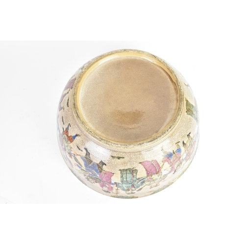 17 - A Chinese crackle glazed famille rose porcelain punch bowl, 19th century, decorated with continuous ... 