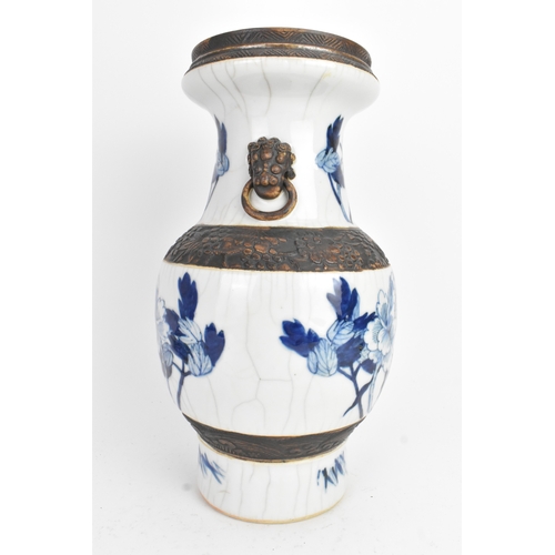 30 - A Chinese late Qing dynasty nanking crackle glazed blue and white vase, late 19th century, decorated... 