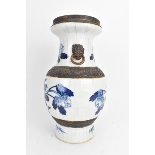 30 - A Chinese late Qing dynasty nanking crackle glazed blue and white vase, late 19th century, decorated... 