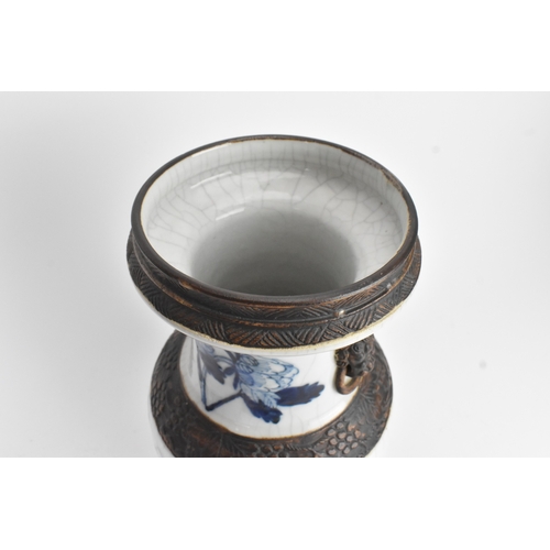 30 - A Chinese late Qing dynasty nanking crackle glazed blue and white vase, late 19th century, decorated... 