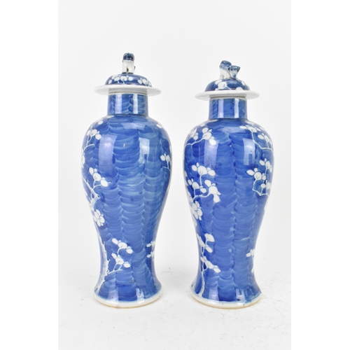 31 - A pair of Chinese blue and white porcelain Qing dynasty vases, late 19th century, each of baluster f... 