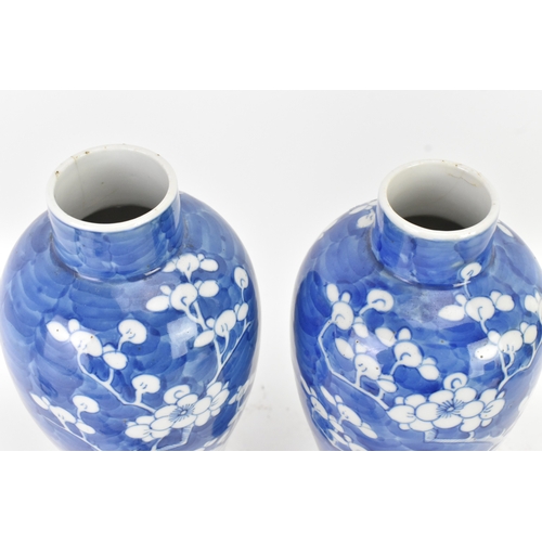 31 - A pair of Chinese blue and white porcelain Qing dynasty vases, late 19th century, each of baluster f... 