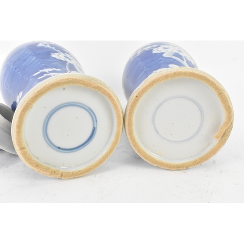 31 - A pair of Chinese blue and white porcelain Qing dynasty vases, late 19th century, each of baluster f... 