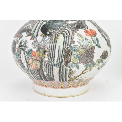 33 - A Chinese famille rose porcelain vase, late 19th/early 20th century, of pear-shaped form with a slen... 
