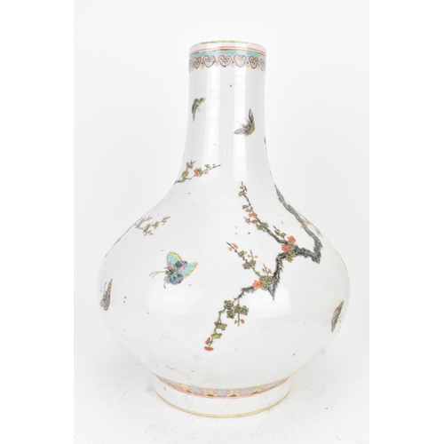 33 - A Chinese famille rose porcelain vase, late 19th/early 20th century, of pear-shaped form with a slen... 