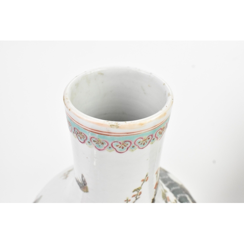 33 - A Chinese famille rose porcelain vase, late 19th/early 20th century, of pear-shaped form with a slen... 