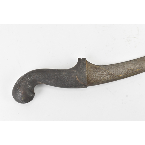 42 - A 19th century Indian dagger, having a curved single-edged blade decorated with traces of gilt inlay... 