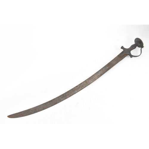 43 - A 19th century Indian tulwar sword, the curved single-edged steel blade with a disc pommel hilt, eng... 
