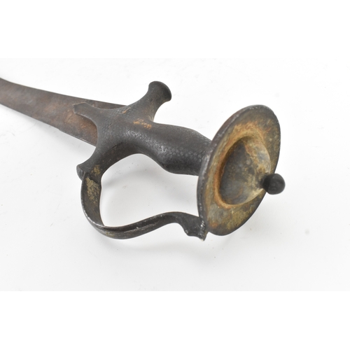 43 - A 19th century Indian tulwar sword, the curved single-edged steel blade with a disc pommel hilt, eng... 