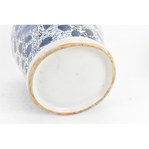 49 - A Chinese blue and white porcelain vase, 20th century, of ovoid form, decorated in the Kangxi style ... 