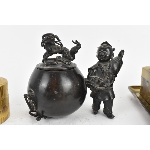 51 - A mixed group of Asian decorative items, comprising two Japanese lacquer boxes with gilt decoration,... 
