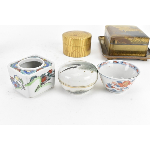 51 - A mixed group of Asian decorative items, comprising two Japanese lacquer boxes with gilt decoration,... 