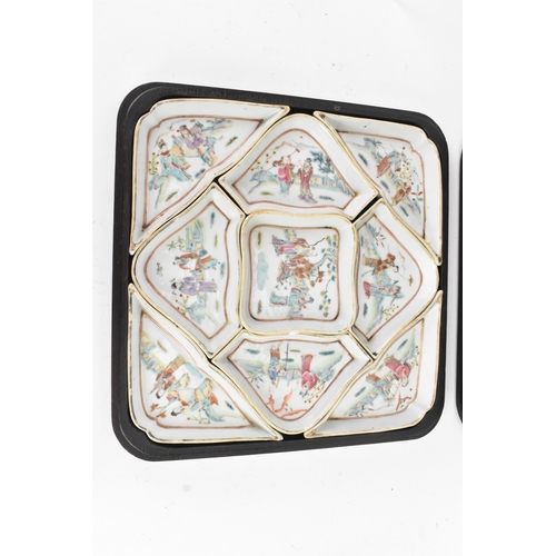 52 - A Chinese export famille rose porcelain sweetmeat set, late Qing dynasty, comprising a group of shap... 