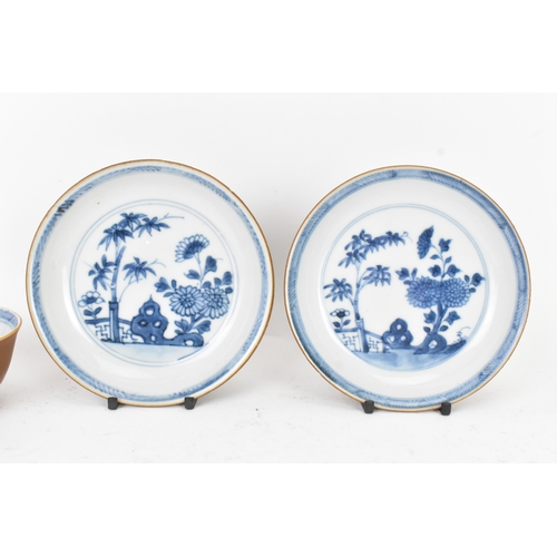 54 - Two Chinese Export Nanking Cargo cafe-au-lait blue and white tea bowls and saucers, Qianlong, mid 18... 