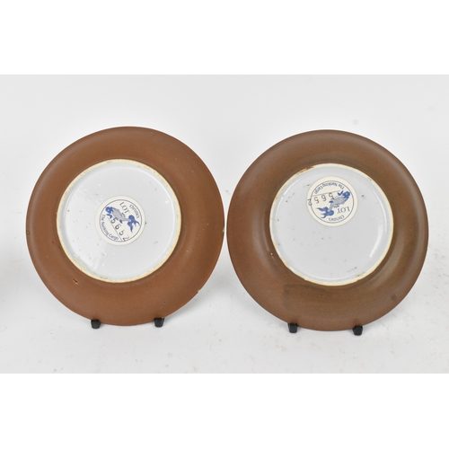 56 - Two Chinese Export Nanking Cargo cafe-au-lait blue and white tea bowls and saucers, Qianlong, mid 18... 