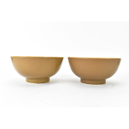58 - Two Chinese Export Nanking Cargo cafe-au-lait blue and white bowls, Qianlong, mid 18th century, each... 