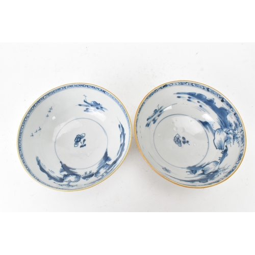 58 - Two Chinese Export Nanking Cargo cafe-au-lait blue and white bowls, Qianlong, mid 18th century, each... 