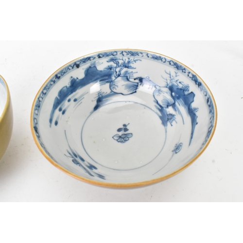 58 - Two Chinese Export Nanking Cargo cafe-au-lait blue and white bowls, Qianlong, mid 18th century, each... 