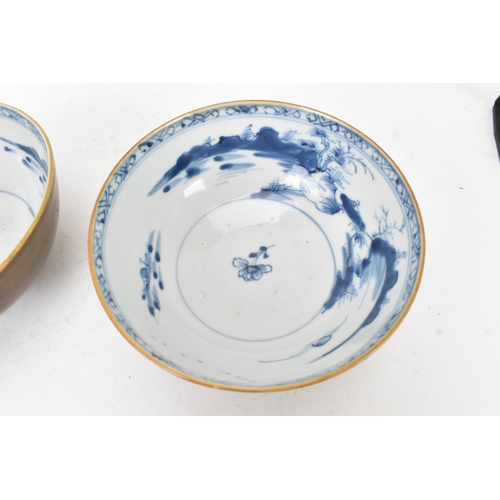 59 - Two Chinese Export Nanking Cargo cafe-au-lait blue and white bowls, Qianlong, mid 18th century, each... 
