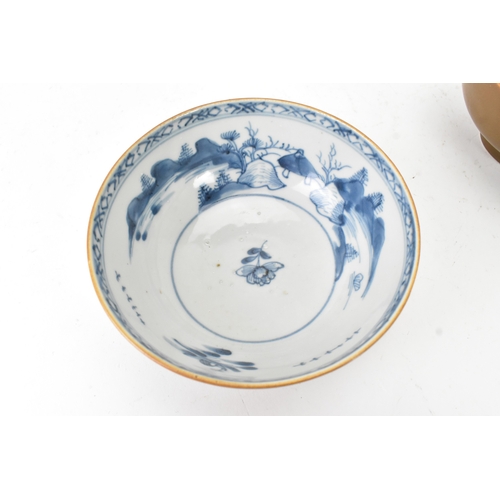 60 - Two Chinese Export Nanking Cargo cafe-au-lait blue and white bowls, Qianlong, mid 18th century, each... 