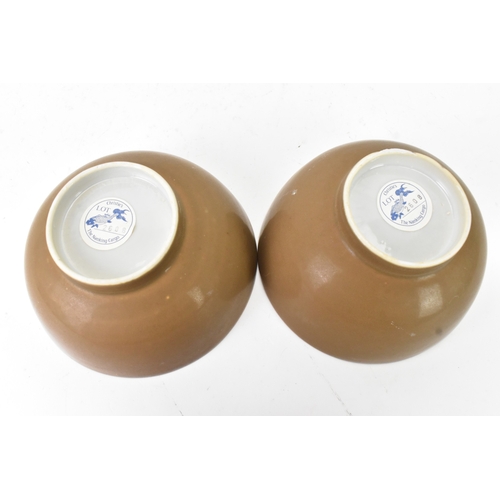 60 - Two Chinese Export Nanking Cargo cafe-au-lait blue and white bowls, Qianlong, mid 18th century, each... 