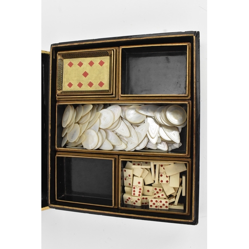 7 - A 19th century Chinese export gilt-decorated games compendium, of rectangular form, the exterior dec... 