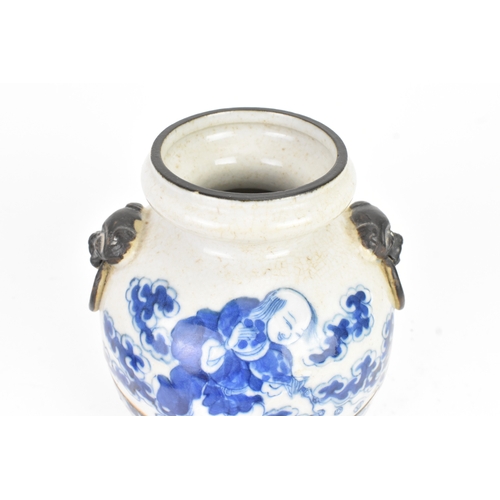8 - A Chinese blue and white porcelain vase, late Qing dynasty, decorated with figures amongst clouds an... 