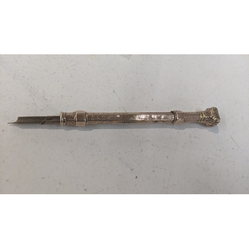 40 - A Victorian rose coloured metal cased vintage propelling pen with gold plated sliders and engraving ... 