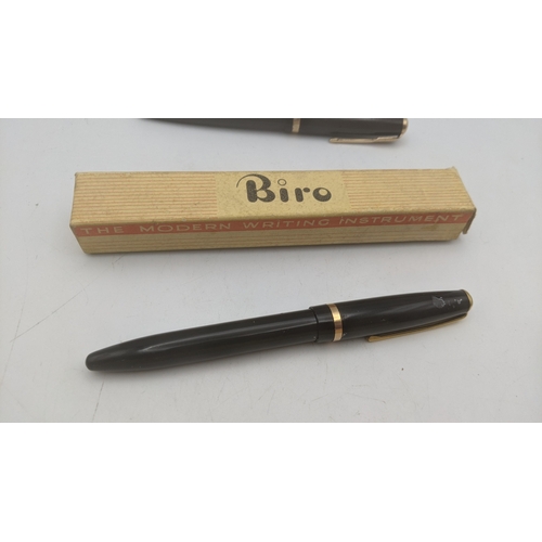 45 - Vintage pens to include a pair of boxed Biro's, a Parker Slimfold with 14ct gold nib and two Parker ... 