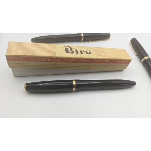 45 - Vintage pens to include a pair of boxed Biro's, a Parker Slimfold with 14ct gold nib and two Parker ... 
