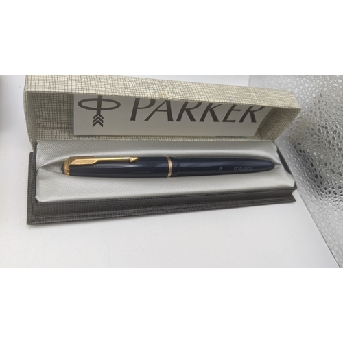 46 - A group of four boxed vintage Parker pens to include Duofold with a 14ct gold nib, a Parker Victory ... 