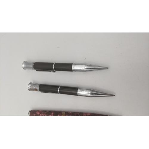47 - Vintage writing instruments to include a Parkette deLuxe propelling pencil without lead, a pair of P... 