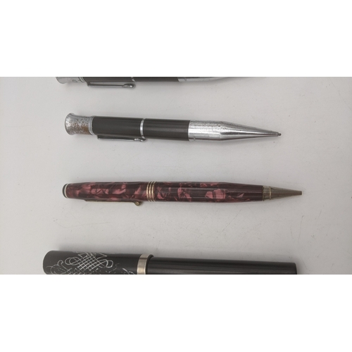 47 - Vintage writing instruments to include a Parkette deLuxe propelling pencil without lead, a pair of P... 