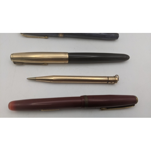 53 - Vintage writing equipment to include a boxed Conway Stewart 36 fountain pen with a blue striped desi... 
