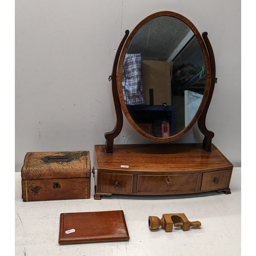 268 - A mixed lot to include a 19th century mahogany dressing table mirror, candle holder with table clamp... 