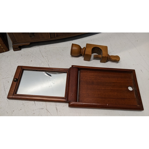 268 - A mixed lot to include a 19th century mahogany dressing table mirror, candle holder with table clamp... 