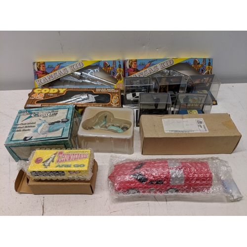 Mixed toys to include two boxed Kansas Kid 100 shot repeater, a Cody 45 ...