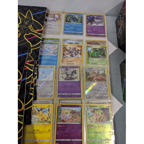A large collection of Pokemon cards to include Players Guides ...