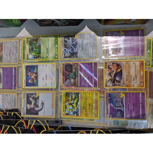 A large collection of Pokemon cards to include Players Guides ...
